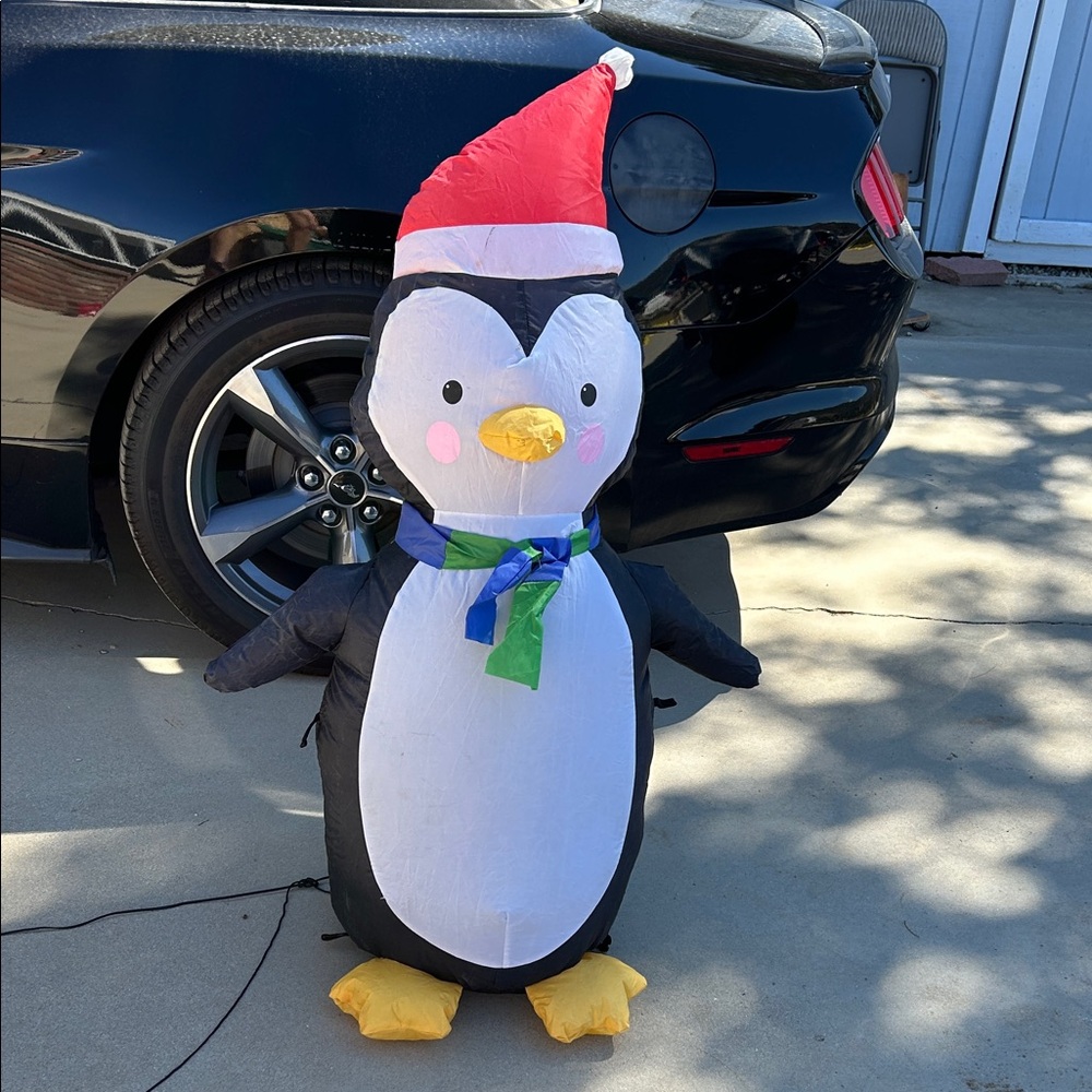 Inflatable Penguin with Santa Hat